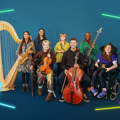 Seven instrumentalists from the National Open Youth Orchestrasmiling at camera surrounded by colourful neon vectors